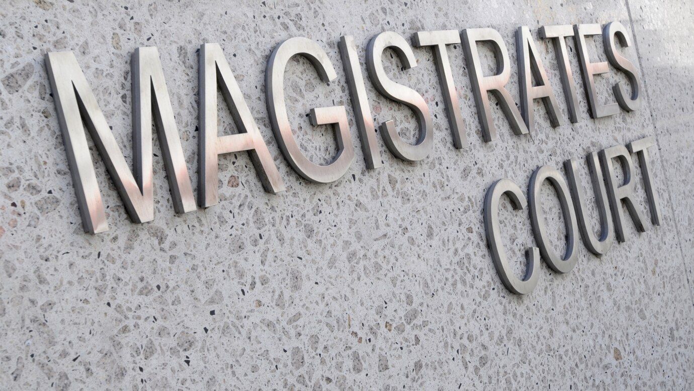 Aluminum trim face channel letters on a cafe storefront